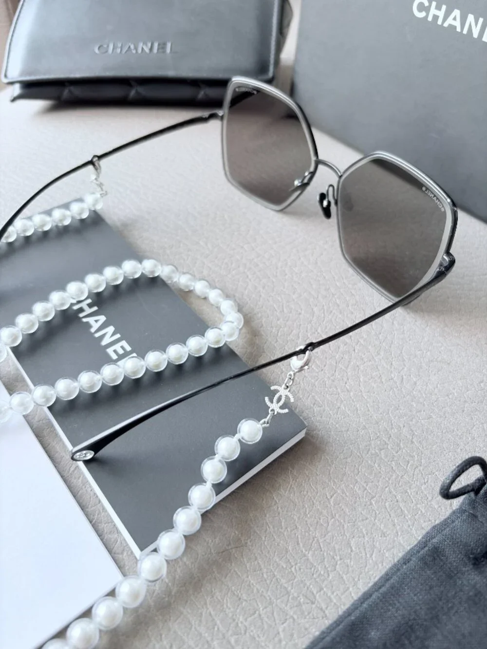 Chanel Butterfly Sunglasses featuring a removable pearl chain